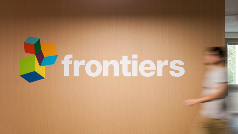 Frontiers office in Lausanne, Frontiers logo on the wall
